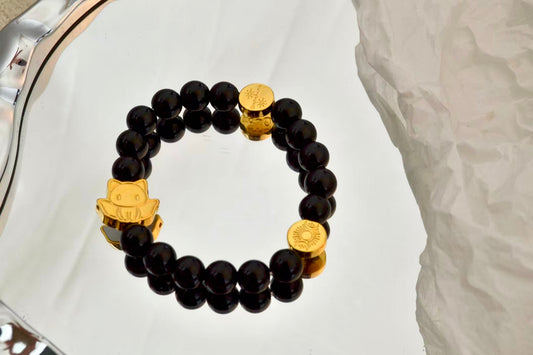 Obsidian · Courage & Protection — Gold Edition