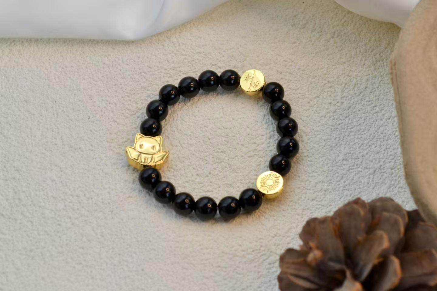 Obsidian · Courage & Protection — Gold Edition